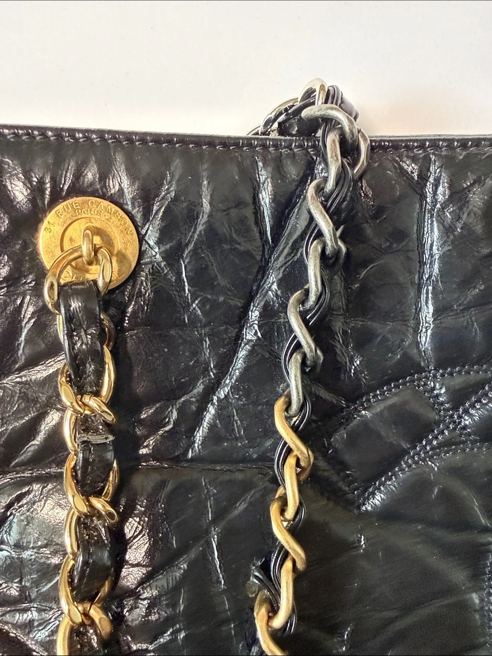 CHANEL Black Quilted Lambskin Shoulder Bag with Chain-Strap